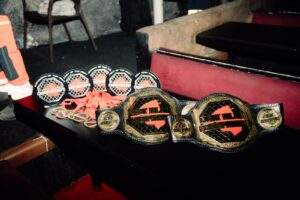 fight island championship belts on show